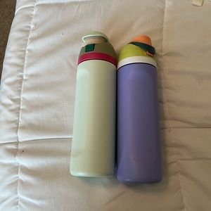 Two Owala 24 oz water bottles